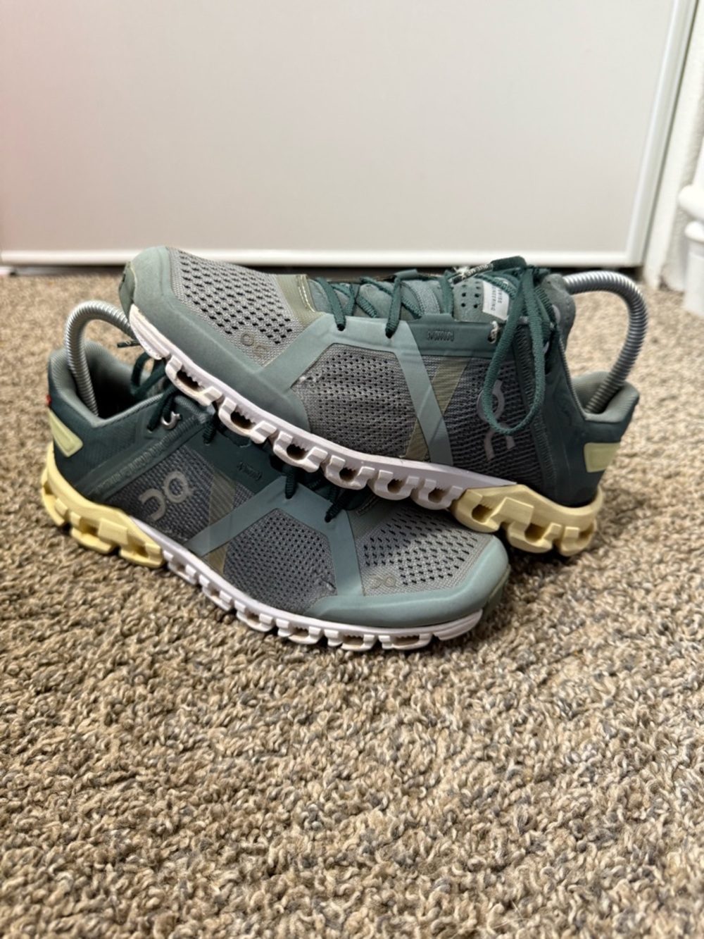 On Running Women's Trail Shoes in Sage Green and Dark Teal